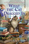 What The Cat Dragged In (Cat In The Stacks Mystery)